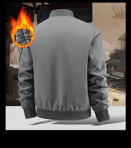 Rear view of grey men's flight jacket showing diamond quilted lining and ribbed cuffs