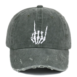 Washed black cotton baseball cap with embroidered skull hand gesture and distressed brim