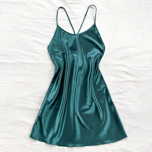 Elegant emerald green silk satin nightgown with thin crisscross straps and an A-line silhouette