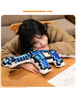 Detail of blue pixel art plush pillow showing firm stuffing and soft texture for back support