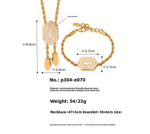 Detailed set of gold plated titanium steel bolo necklace and bracelet with zircon pendants