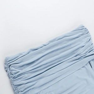 Close-up of light blue elastic knitted fabric featuring dense horizontal ruched textures