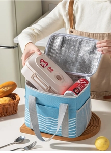 Detail of insulated lunch bag showing thick aluminum foil lining for thermal insulation