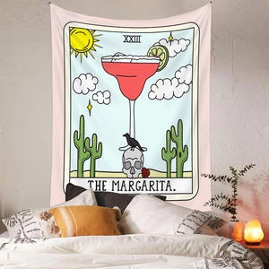Detail of bohemian Margarita tarot tapestry hanging over a bed in a cozy bedroom scene