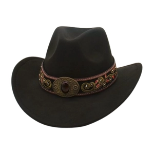 Detail of western cowboy hat with ethnic embroidered band and vintage bronze buckle