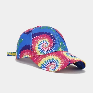 Macro view of multi-color tie-dye rainbow baseball cap with premium cotton fabric texture