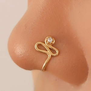 Minimalist gold U-shaped nose cuff with sparkling zircon stone for non-pierced wear