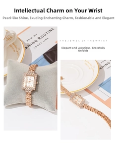 Detail of rose gold rectangular watch with rhinestone bezel and leaf-shaped metal strap