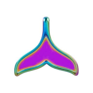 Macro detail of rainbow gradient 304 stainless steel fishtail charm with metallic luster