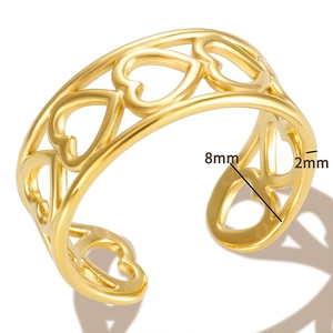 Detail view of gold V-shaped open ring showing 8mm width and 2mm thickness parameters