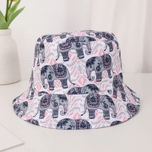 Reversible bucket hat featuring stylish bohemian elephant prints on a white background