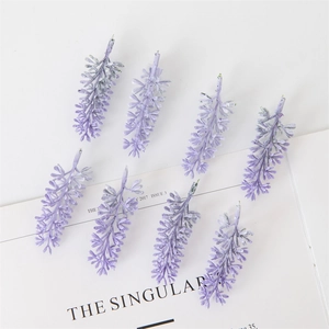 Set of 8 purple artificial lavender flower stems for Christmas decor on a white background