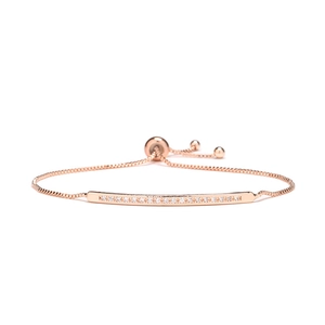 Rose gold adjustable bolo bracelet with a curved bar set with sparkling cubic zirconia