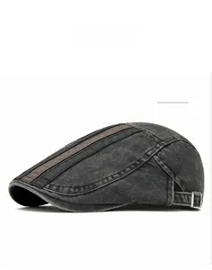 Detail of grey washed cotton flat cap with racing stripes and adjustable metal buckle
