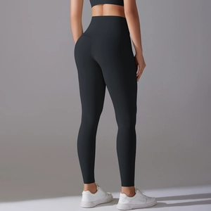 Detailed back view of high-waisted black yoga leggings with V-shaped lifting seam