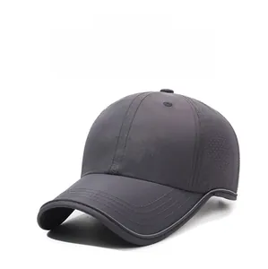 Close-up of dark grey quick-dry baseball cap featuring breathable laser-cut side vents