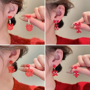 Red dragon year pearl bow earrings with traditional Chinese character charms for women