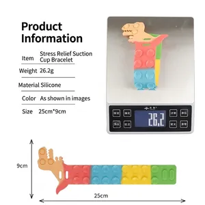 Silicone dinosaur suction cup wristband with colorful fidget bubbles for stress relief