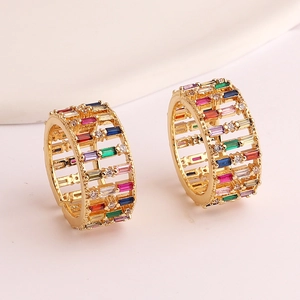 Golden wide band ring with rainbow zircon pavé and three-layer hollow design