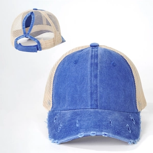 Detail of navy washed denim ponytail trucker hat with breathable mesh and velcro strap