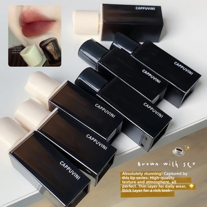 Detailed view of six glossy black lip glaze tubes featuring brown-red shades 824 and 829