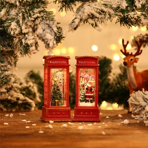 Close-up of red Christmas telephone booth lamp with Santa Claus and festive warm lighting