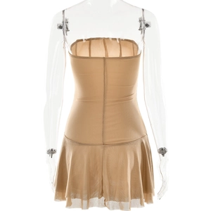 Detail view showing the back of a beige tube mini dress with sheer mesh and pleated skirt