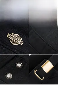 Detail view of cotton flat cap featuring metal logo, stitched seams, and adjustable buckle