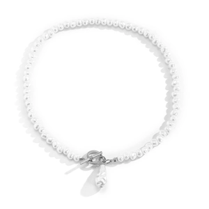Detail of vintage faux pearl necklace with silver OT clasp and baroque pearl pendant