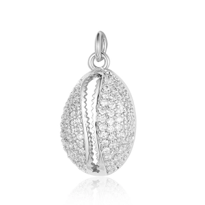 Detailed close-up of shell-shaped silver pendant with sparkling cubic zirconia stones