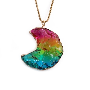 Rainbow crescent moon pendant with gold twisted rope chain on white background