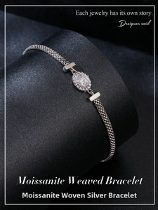 Close-up of weaved S925 sterling silver bracelet featuring a 0.5ct moissanite gemstone