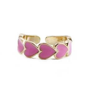 Close-up of gold-plated adjustable ring with pink enamel hearts and polished finish