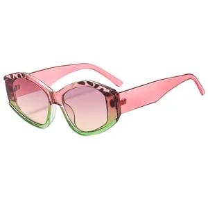 Fashionable geometric hexagon sunglasses with pink gradient lenses and leopard print accents