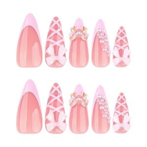Pink French almond press-on nails with 3D bows, pearls and balletcore ribbon designs