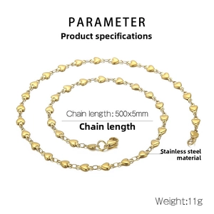 Detail of golden heart-shaped stainless steel link chain with a secure lobster clasp