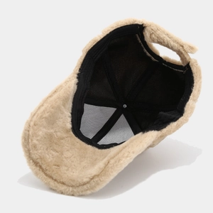 Detail view of the warm plush winter baseball cap interior with fleece lining and mesh panels