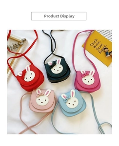 Detailed flat lay of children rabbit crossbody bags in five vibrant colors with 3D bunny decor