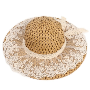 Summer wide brim straw hat with elegant white lace bow and edge trim for women