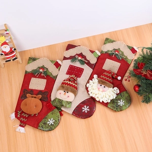 Three large Christmas stockings featuring 3D Santa, Snowman and Reindeer characters