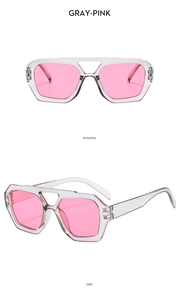 Gray-pink geometric aviator sunglasses with dual-bridge frames and hexagonal pink lenses