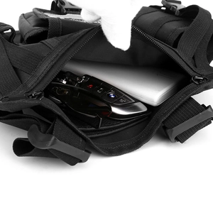 Internal view of tactical chest bag showing main pocket capacity with car keys and sunglasses