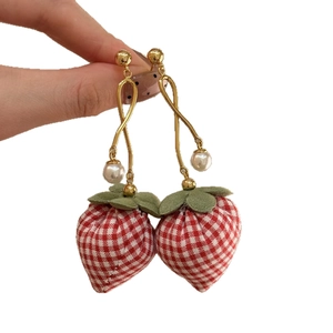 Handmade strawberry drop earrings with red checkered fabric and delicate pearl accents