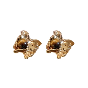 Irregular gold fluid earrings with tiger eye stone in vintage minimalist design