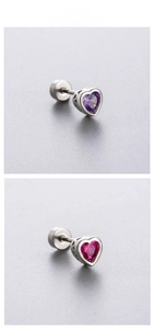 Detail of heart-shaped zircon earrings with secure screw-back design in purple and rose red
