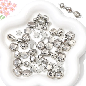 Silver CCB star and cross beads in ceramic dish for DIY jewelry making material