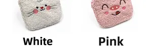 Close-up of soft plush sanitary pad pouch with cute animal embroidery and metal zipper