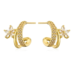 Detail of 18K gold plated flower C-shape stud earrings with sparkling cubic zirconia