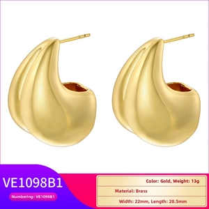 Detail view of gold brass teardrop earrings showing 22mm width and 28.5mm length dimensions