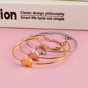 Three-color minimalist stainless steel elephant bangle with a crystal-embedded charm